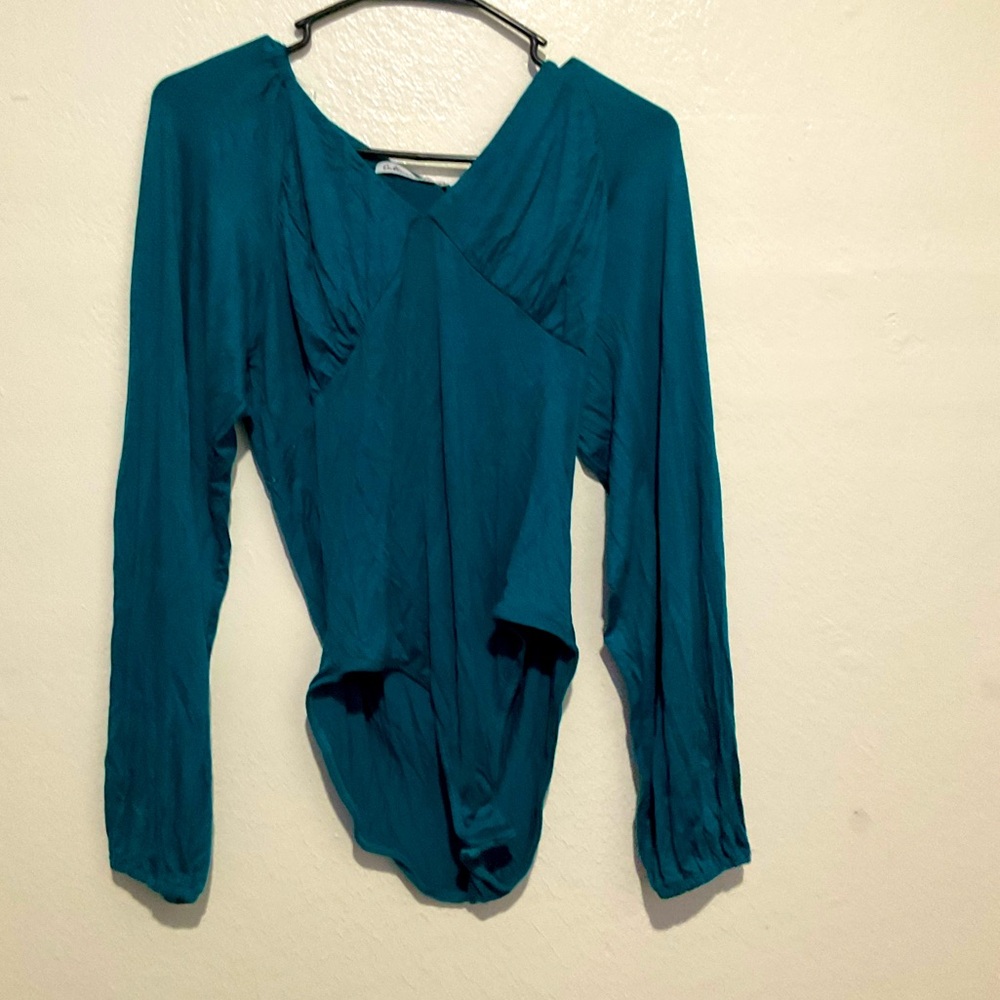 Women’s long sleeve blue body suit